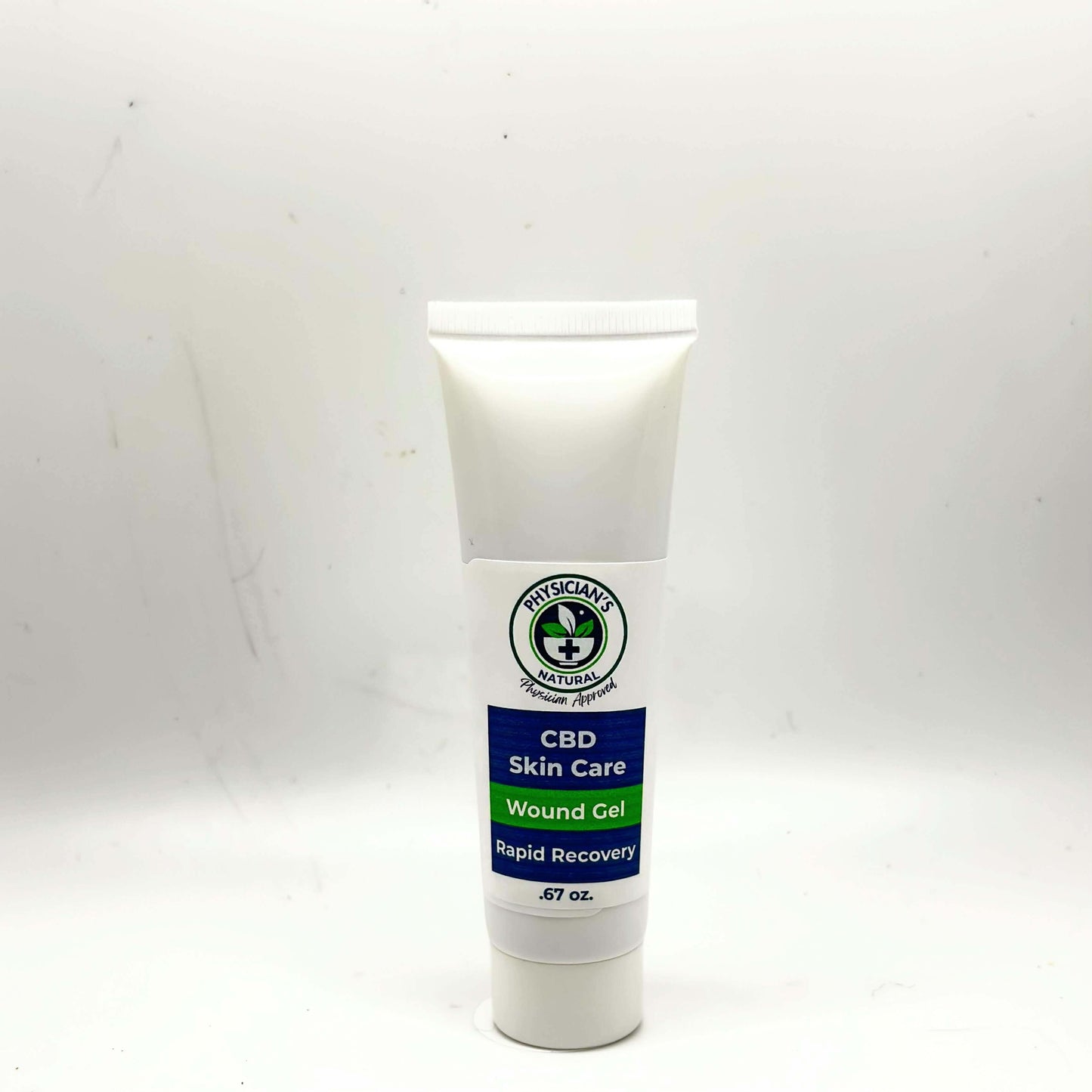 White tube with green and blue label, CBD Skin Care - Wound Gel Rapid Recovery on a solid white background. 